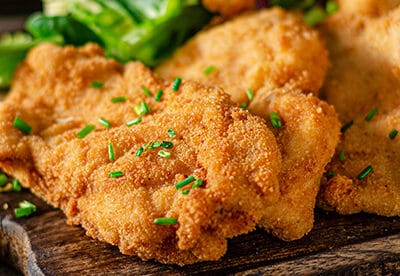 Șnițele din piept de pui la tavă